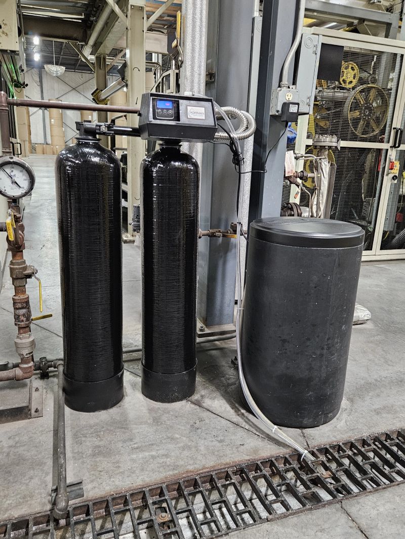 Twin digital water softeners installed in a commercial facility, Hoffman Soft Water field service